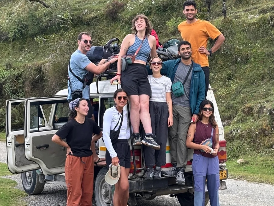 tourists standing on a tampo traveler