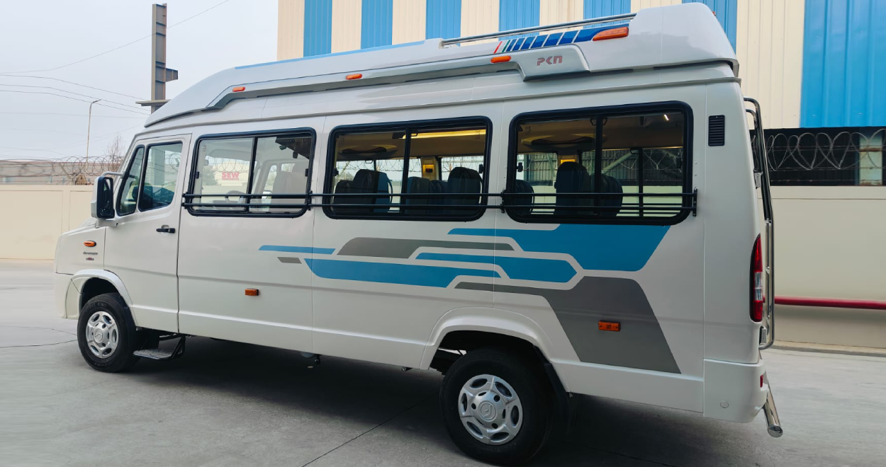 tiwari travel - white luxury tampo traveler